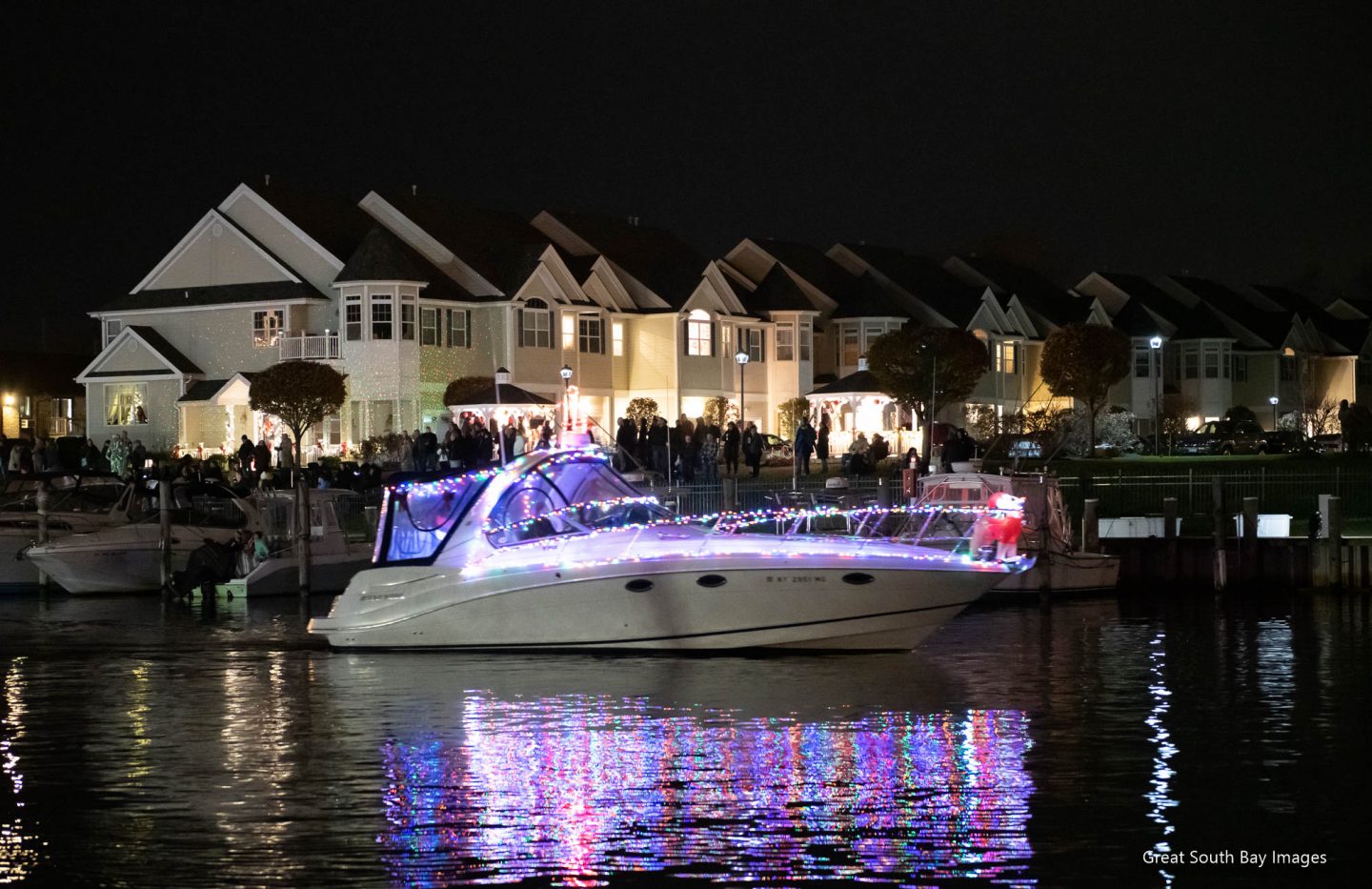 Photos and Video Christmas Boat Parade on the Patchogue River Fire