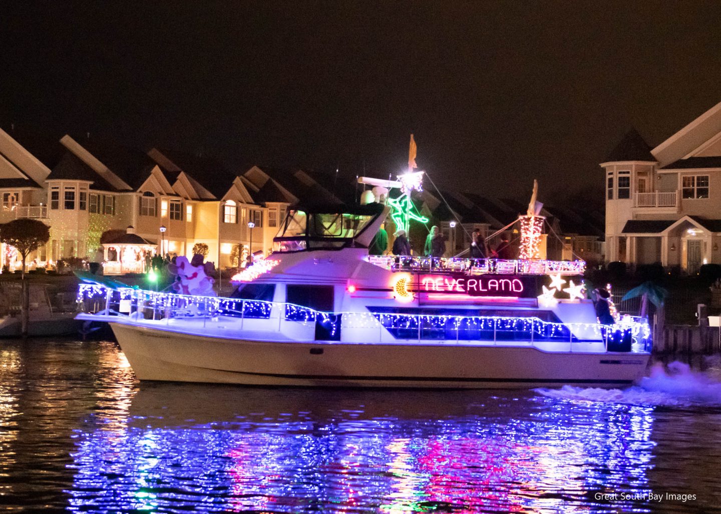 Photos and Video Christmas Boat Parade on the Patchogue River Fire